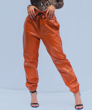 Load image into Gallery viewer, Mon Amie Cherry, #PUjoggers, #FauxLeatherJoggers, Black Joggers, Black Pants, #sexywear, #streetwear, casual, #bbrownpants, #sexymom, #partypants